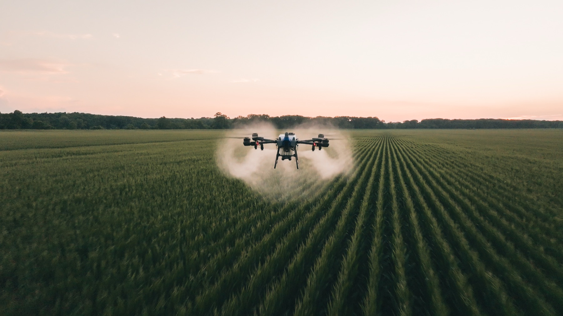 EA Vision spray drone working over a field