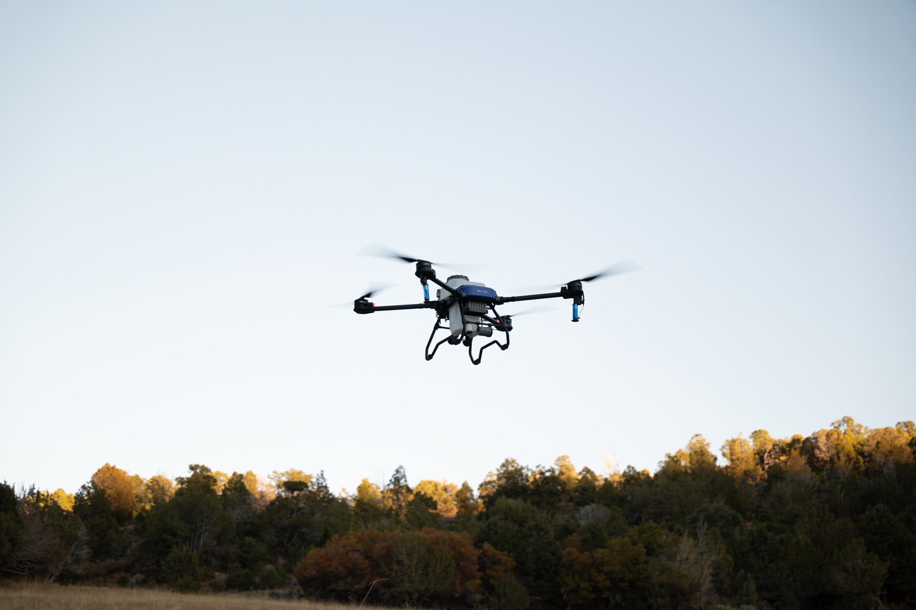 EA Vision J70 spray drone in flight